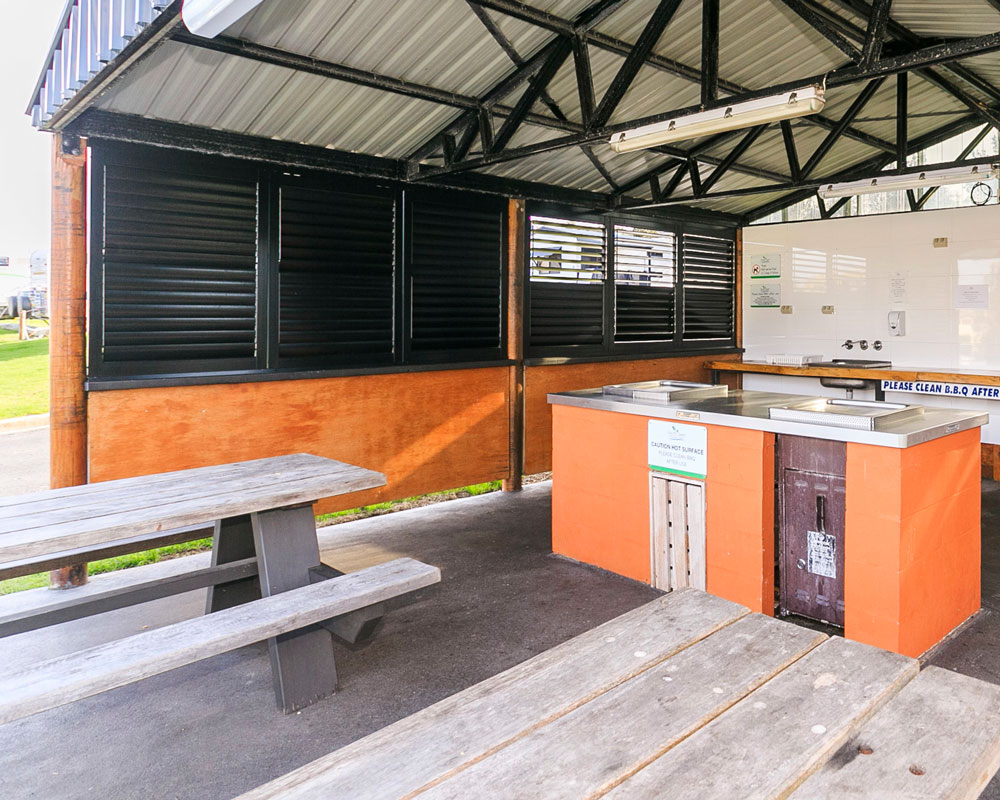 The camp kitchen dining area at Bermagui Tourist Park