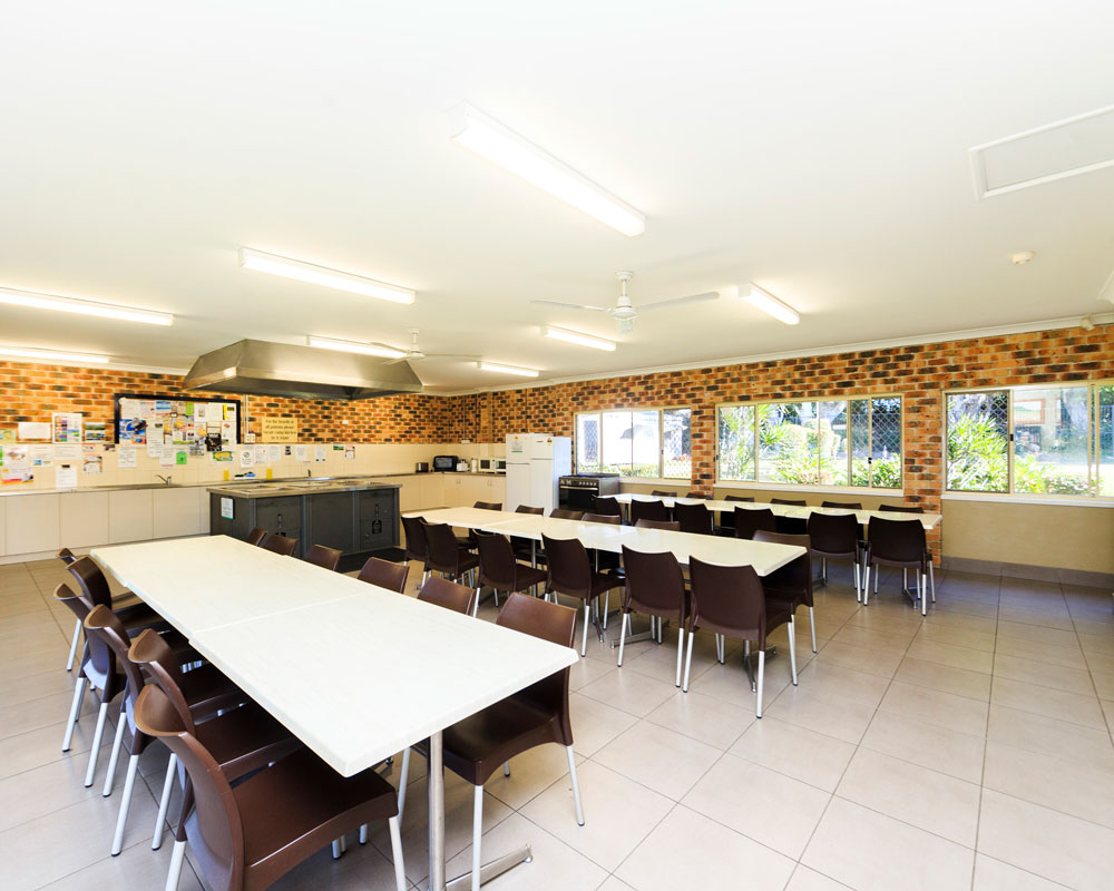Camp kitchen dining area at Urunga Heads caravan park